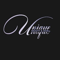 the logo for unique beauty studio on a black background