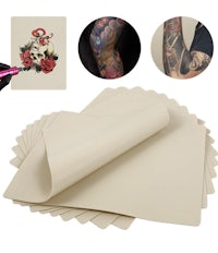 a sheet of beige paper with a tattoo on it