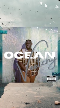 the cover of ocean vibes with a man standing in front of a body of water