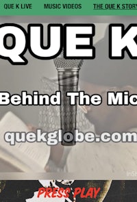 a microphone with the words'que k behind the mic'