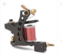 a tattoo machine with a red spool and a black spool