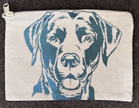 a zipper pouch with a black labrador dog on it