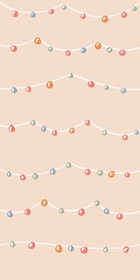 a colorful christmas garland on a beige background