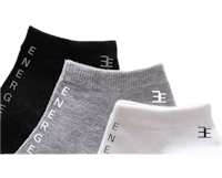 three pairs of socks with the word energize on them