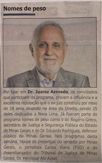 a newspaper with a picture of a man in a suit