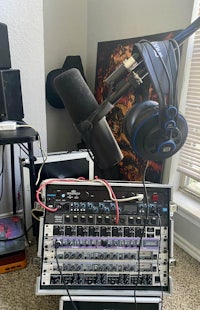 a recording setup with a microphone and headphones