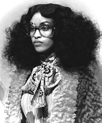 a black and white photo of a woman wearing glasses and a fur coat