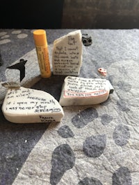 a group of rocks with writing on them