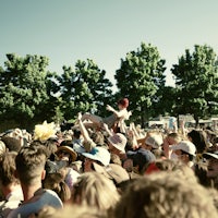 a crowd of people at a music festival