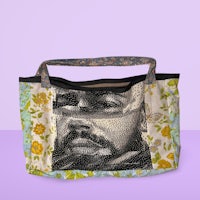 a tote bag with an image of a man with a beard