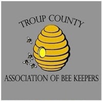the logo for the troup county association of bee keepers