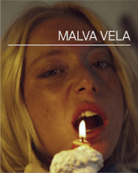 a woman is holding a candle with the words malva vela on it