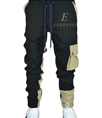 a pair of black and tan jogging pants with the word energize on them