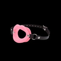 an image of a pink rubber shackle on a black background